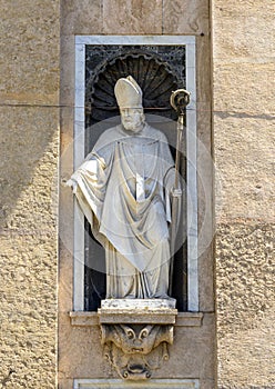 Statue of Saint Ambrogio on the facade of the Chiesa del Gesu in Piazza Matteotti in Genoa, Italy.