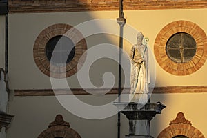 the statue of Saint Apollinare at Piazza del Popolo photo