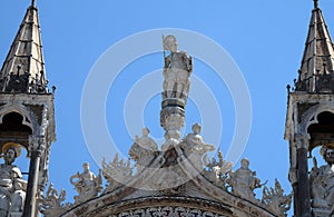 Statue of Saint, detail of the facade of the Saint Mark`s Basilica in Venice