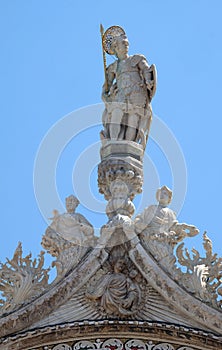 Statue of Saint, detail of the facade of the Saint Mark`s Basilica, Venice