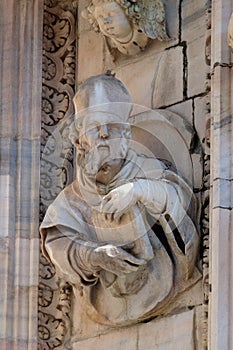 Statue of Saint on the facade of the Milan Cathedral, Duomo di Santa Maria Nascente, Milan, Italy