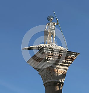 Statue in the Saint Mark Square in Venice with St Theodore and a