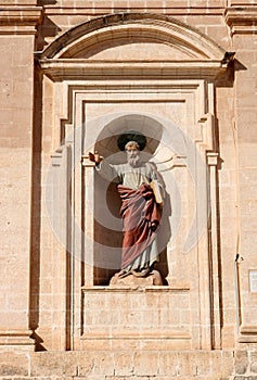 Statue of Saint Paul in wall of building, Mellieha, Malta