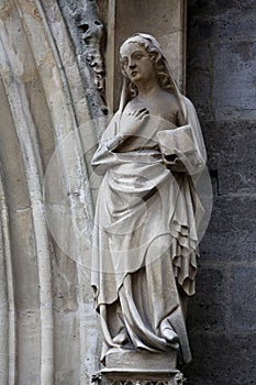 Statue of Saint, portal of Minoriten kirche in Vienna