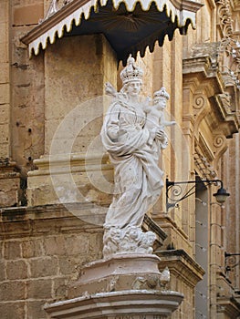 A statue of a saint in the street of Mdina. Malta.