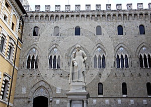 Statue of Sallustio Bandini 1677 - 1760, a priest and one of the first Italian economists, at Piazza Salimbeni, Siena, Italy