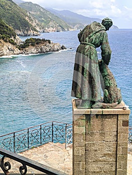 statue of San Francesco with panorama