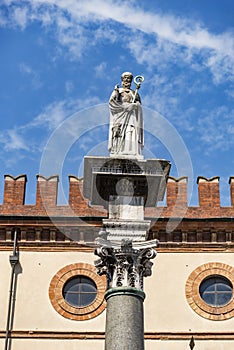 The statue of San Vitale rises in Piazza del Popolo in Ravenna photo