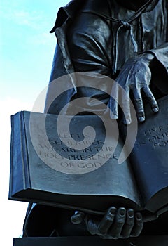 Statue and Scripture
