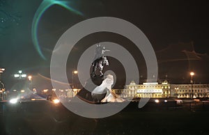 Statue in Senate Square in St. Petersburg at night