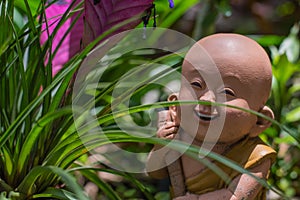 The statue is sent to smile the way through the past.