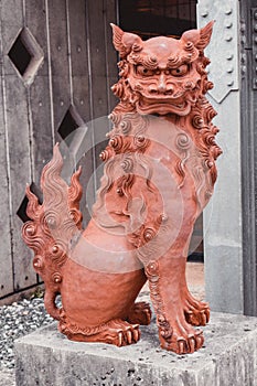 Statue of Shisa the guardian half lion half dog idol at Okinawa Naha Japan