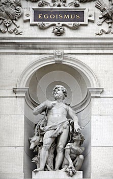 Statue shows an allegory of egoism, Burgtheater, Vienna