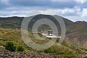 Statue of Siddhartha Gautam Buddha overlooking the Muktinath Village in Upper Mustang, Nepal