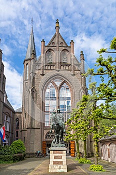 Statue of Sint Maarten Utrecht with old church