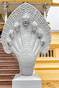 Statue of the Snake God, Naga in Cambodia Phnom Penh Royal Palace Silver Pagoda.