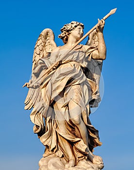Statue on St. Angel bridge Ponte Sant`Angelo in Rome, Italy