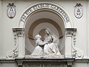 Statue of St Catherine and the Virgin Mary outside the Chapelle Notre Dame de la Medaille Miraculeuse in Paris