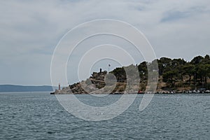 Statue of St. Peter on the St. Peter peninsula in Makarska, Croatia