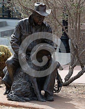 Statue symbolizing a cowboy and his dog