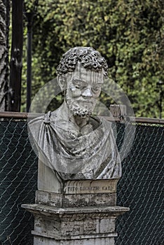 Statue of Tito Lucrezio Caro in the villa Borghese gardens photo