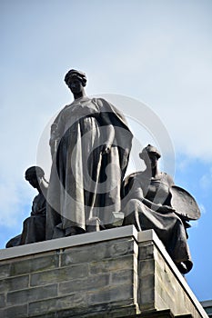 Statue on top of the Carnegie Music Hall