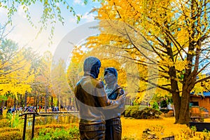 Statue and Tourists taking photos of the beautiful scenery around at Nami Island in seoul,South Korea,19 November 2019.