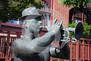 Statue trumpet man