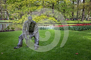 Statue with tulip in the Keukenhof photo