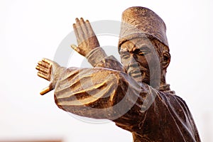Statue of Uyghur dancer photo