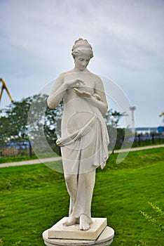 Statue of Venus with a butterfly in Alleya Statuy of Ermitazh-Vyborg, Vyborg, Russia