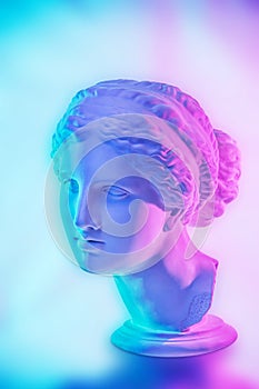 Statue of Venus de Milo. Creative concept colorful neon image with ancient greek sculpture Venus or Aphrodite head