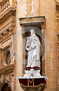 The statue of the Virgin Mary and baby Jesus on the corner of Ca