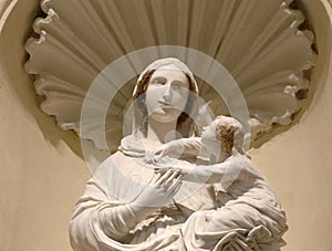Statue of the virgin mary with the baby jesus