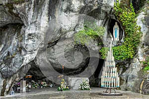 Statue of Virgin Mary in the grotto of Our Lady of Lourdes France