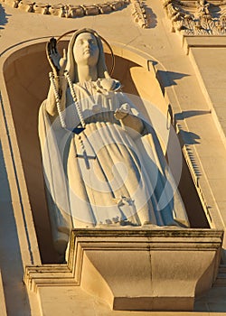 Statue of the Virgin Mary holding a Rosary at the Sanctuary of F