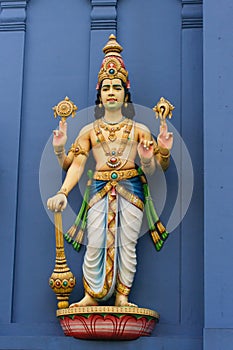 Statue of Vishnu on Hindu tem photo