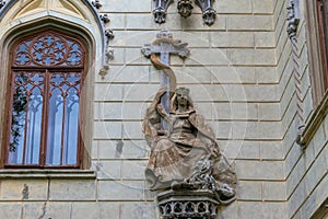 Statue on the walls of the Sturdza Castle from Miclauseni, Romania