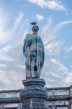 Statue of Walter Montagu Douglas Scott, 5th Duke of Buccleuch on the Parliament Square in Edinburgh, Scotland photo