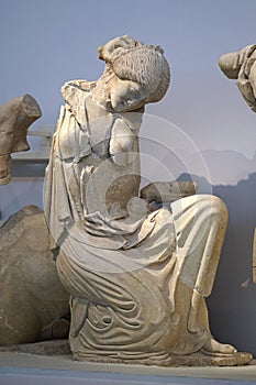 Statue of a woman at the archaeological site of Olympia