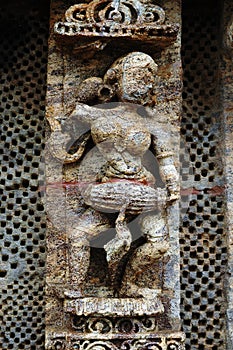 STATUE OF A WOMAN AT KONARK TEMPLE OF ORISSA-INDIA