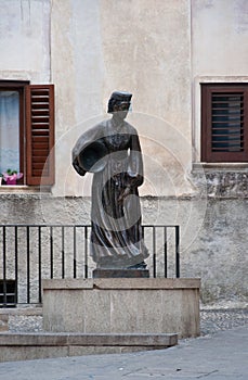 Statue of a woman from scanno photo