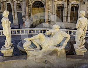 Statue of young man with grapes in The Praetorian Fountain by Francesco Camilliani Fountain of Shame, 1574 in Piazza Pretoria in