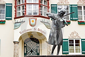 Statue of young Mozart in front of townhall in St. Gilgen, Austria