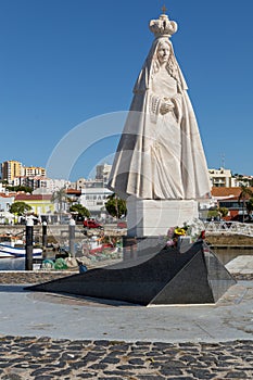 Statue “Nossa Senhora do Rosário de Tróia” at the Port in Setúbal who protects the fishermen who risk their lives every day