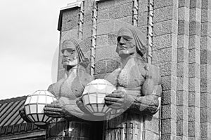 Statues adorn the main railway station, Helsinki.