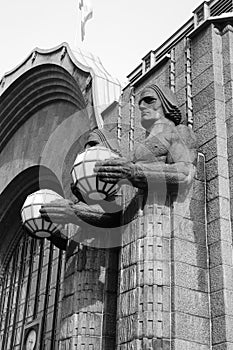 Statues adorn the main railway station, Helsinki.