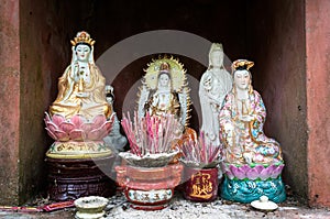 Statues of Asian Buddhist goddess, Guanyin, the Goddess of Mercy photo