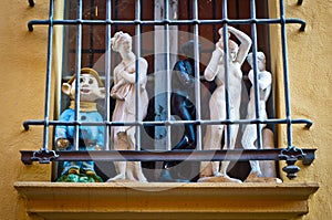 Statues Behind Bars