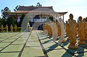 Statues in the buddhist temple of Iguassu Falls, Brazil. photo